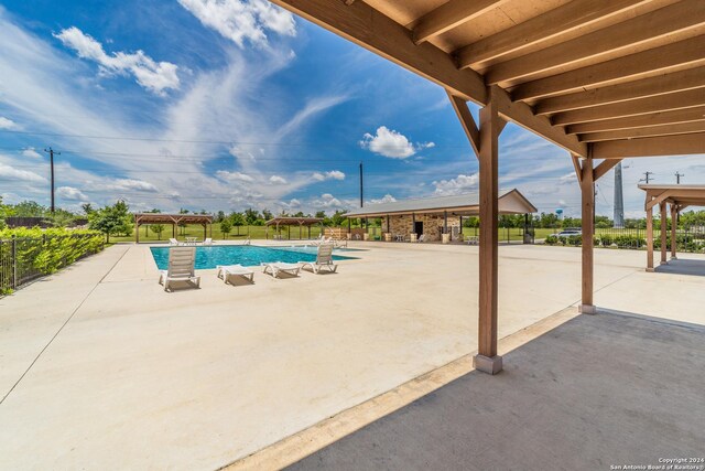 142 Ashley Loop, San Antonio, TX 78253 - view of swimming pool featuring a pergola and a patio