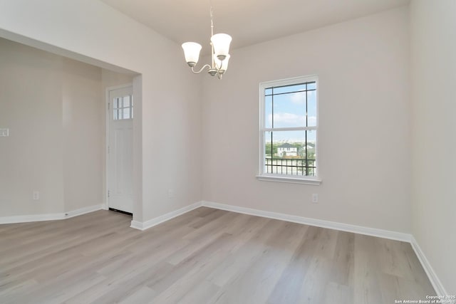 142 Ashley Loop, San Antonio, TX 78253 - spare room featuring healthy amount of natural light, a chandelier, and light wood-style flooring