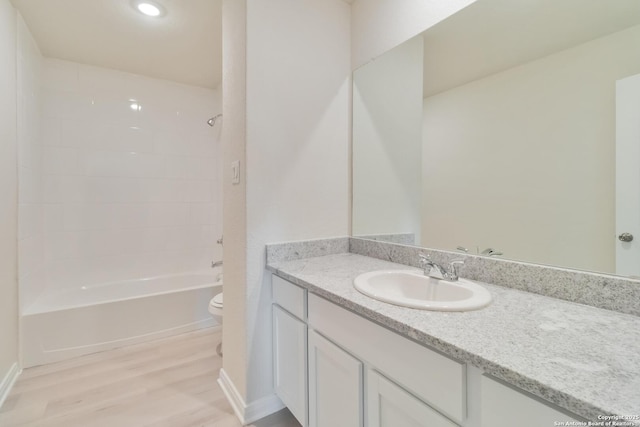142 Ashley Loop, San Antonio, TX 78253 - bathroom with vanity, wood finished floors,  shower combination, and recessed lighting