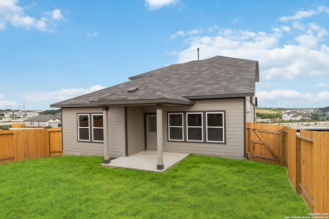 142 Ashley Loop, San Antonio, TX 78253 - rear view of property featuring a fenced backyard, a patio area, roof with shingles, and a gate