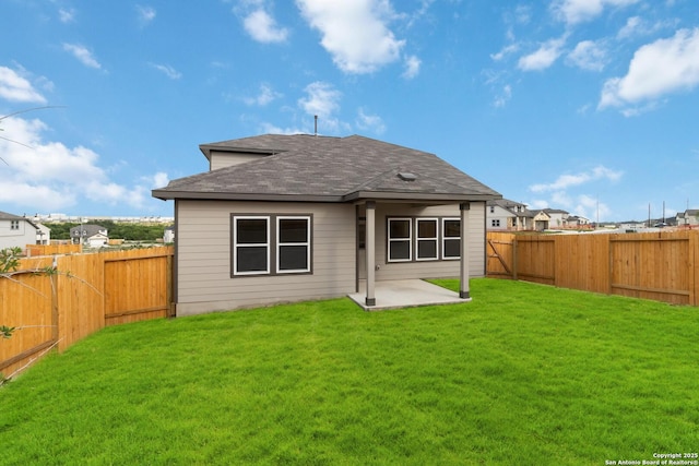 142 Ashley Loop, San Antonio, TX 78253 - rear view of property featuring a shingled roof, a fenced backyard, and a patio area