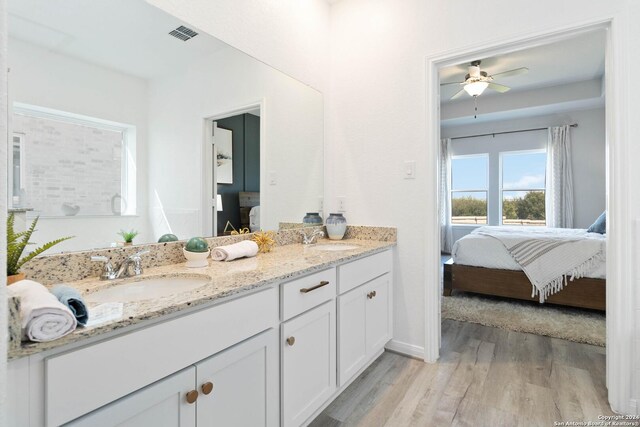 142 Ashley Loop, San Antonio, TX 78253 - bathroom featuring vanity, hardwood / wood-style flooring, and ceiling fan