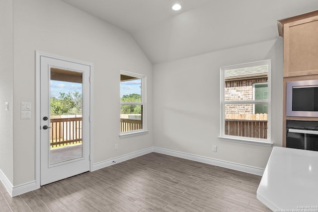 11423 Buffalo Bill, San Antonio, TX 78254 - unfurnished dining area with vaulted ceiling and light wood finished floors