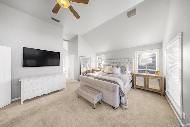 carpeted bedroom with vaulted ceiling, multiple windows, and ceiling fan