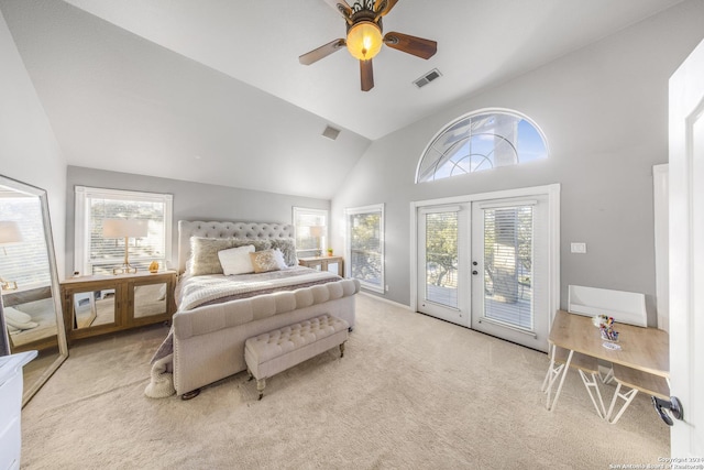 carpeted bedroom with ceiling fan, access to exterior, high vaulted ceiling, and french doors