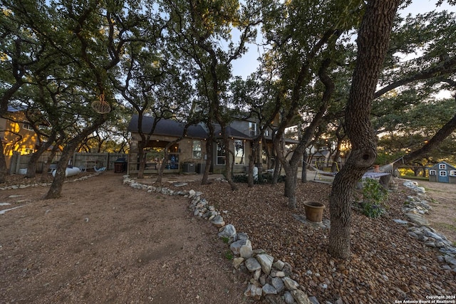 single story home with central AC unit