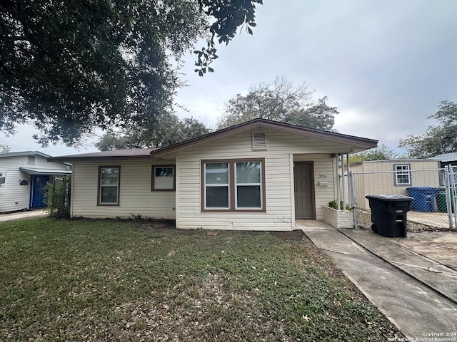 view of front of home with a front yard