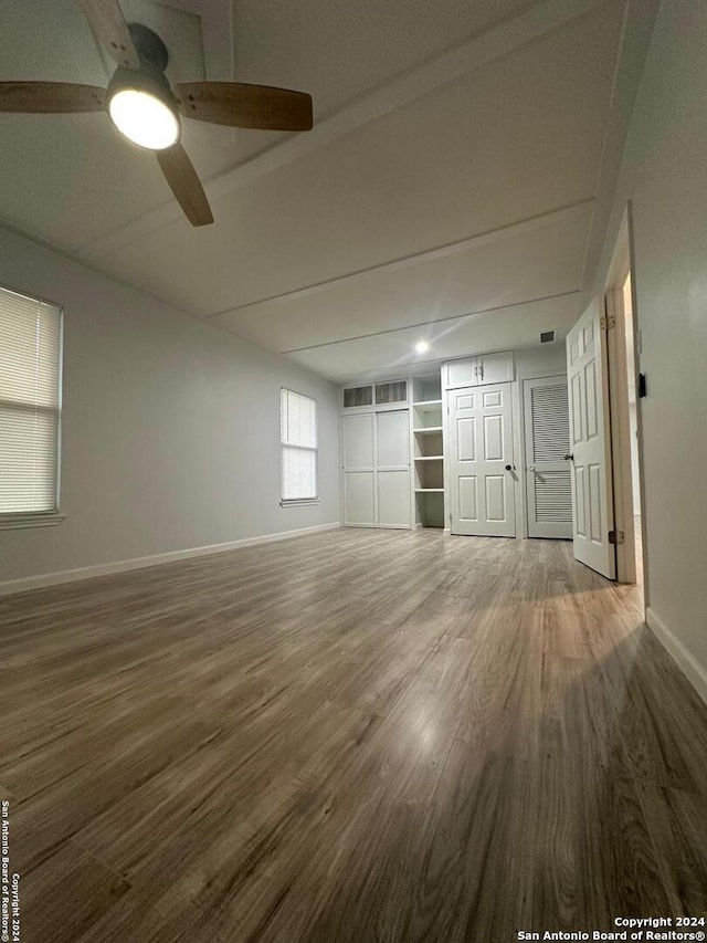 unfurnished room featuring ceiling fan and wood-type flooring