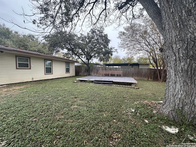 view of yard featuring a wooden deck