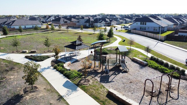 view of property's community featuring a playground