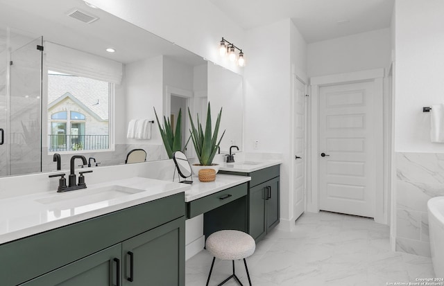 bathroom with vanity, tile walls, and independent shower and bath