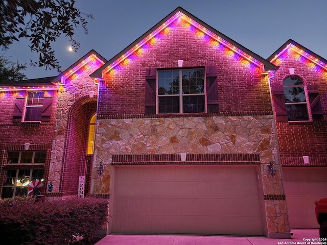 view of front of home with a garage