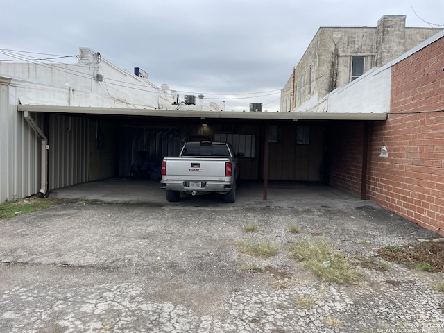 view of parking with a carport