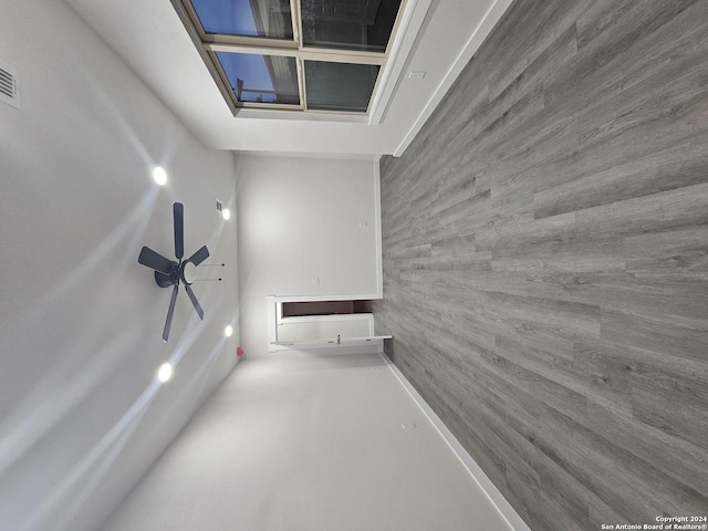 hallway featuring concrete floors