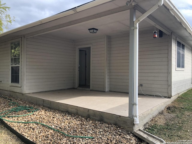 exterior space with a patio area