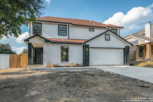view of property featuring a garage