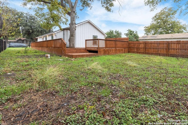 view of yard featuring a deck