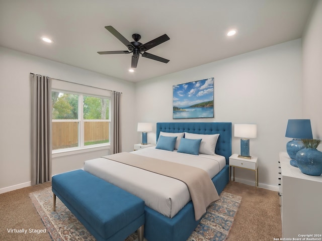 bedroom featuring ceiling fan and carpet floors