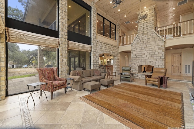 694 Scenic Cir, Pipe Creek, TX 78063 - lobby featuring a towering ceiling, wooden ceiling, and recessed lighting