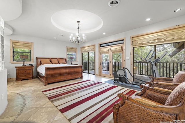 694 Scenic Cir, Pipe Creek, TX 78063 - bedroom featuring access to exterior, a chandelier, recessed lighting, multiple windows, and inlaid floor details