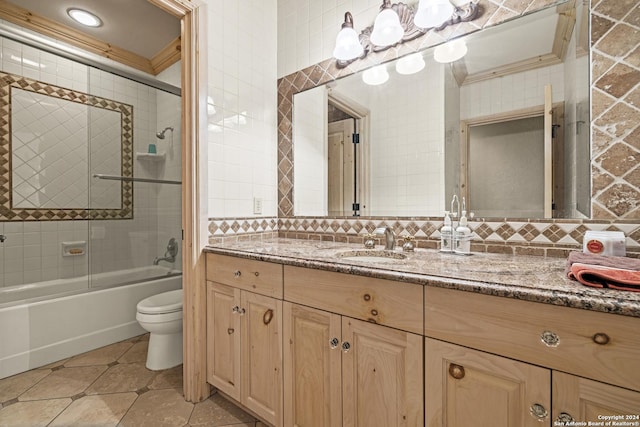 694 Scenic Cir, Pipe Creek, TX 78063 - bathroom featuring vanity, decorative backsplash, shower / bath combination with glass door, tile patterned floors, and crown molding