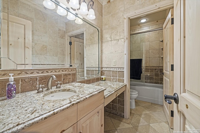 694 Scenic Cir, Pipe Creek, TX 78063 - full bathroom featuring tile walls, vanity, crown molding, tub / shower combination, and decorative backsplash