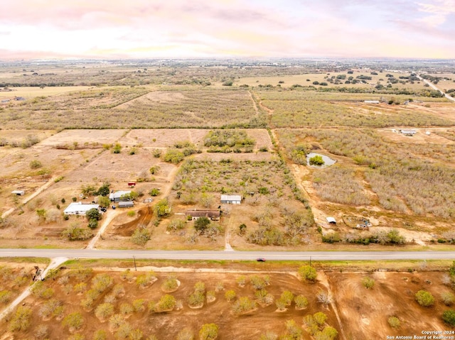 aerial view at dusk with a rural view