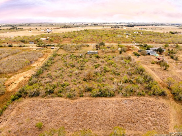 aerial view at dusk with a rural view