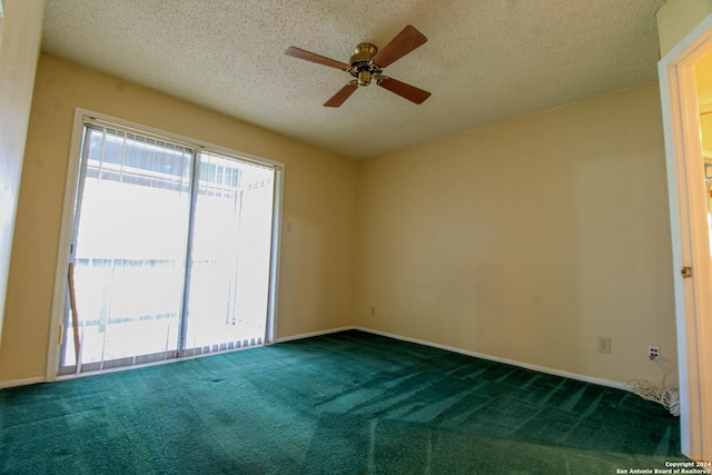 unfurnished room featuring a textured ceiling, carpet floors, and ceiling fan