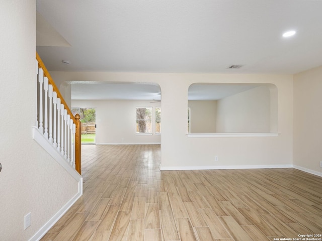 empty room with light hardwood / wood-style floors