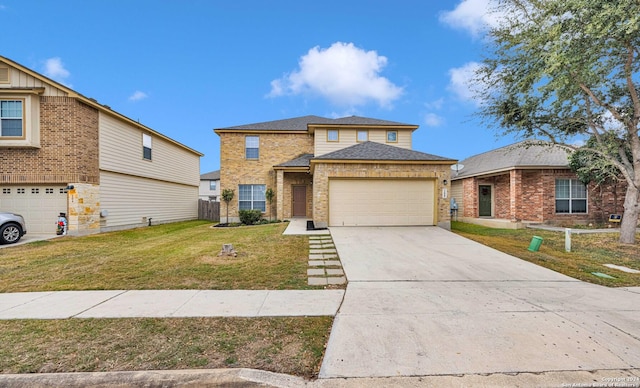 view of front of home featuring a garage and a front lawn