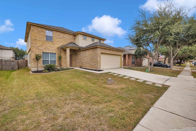 view of front facade featuring a garage and a front lawn