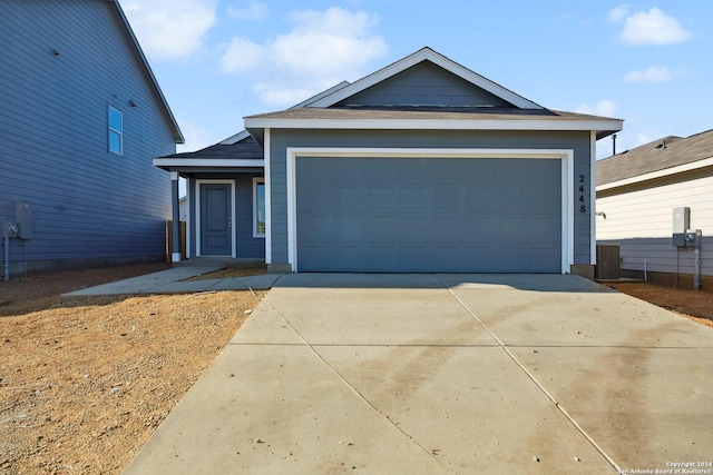 ranch-style home with a garage