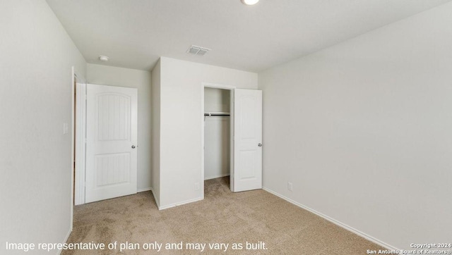 9926 Auger Run, San Antonio, TX 78214 - unfurnished bedroom featuring carpet flooring, a closet, and baseboards