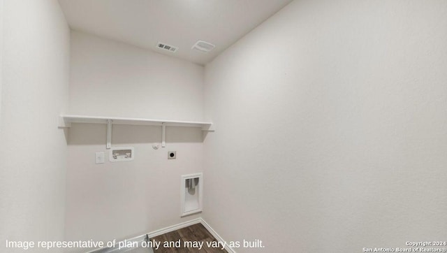 9926 Auger Run, San Antonio, TX 78214 - laundry room with hookup for an electric dryer, hookup for a washing machine, gas dryer hookup, wood finished floors, and baseboards