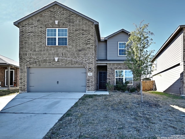 front of property featuring a garage