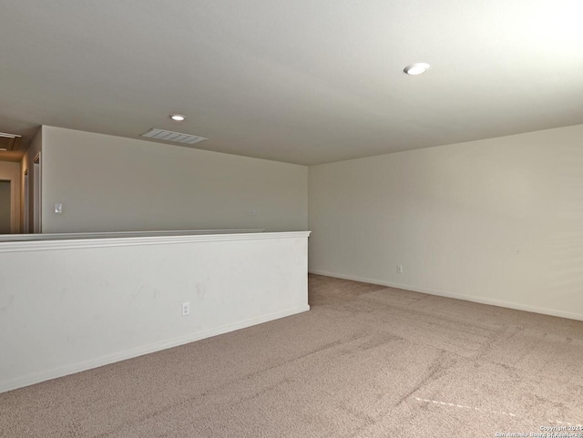 unfurnished room with carpet