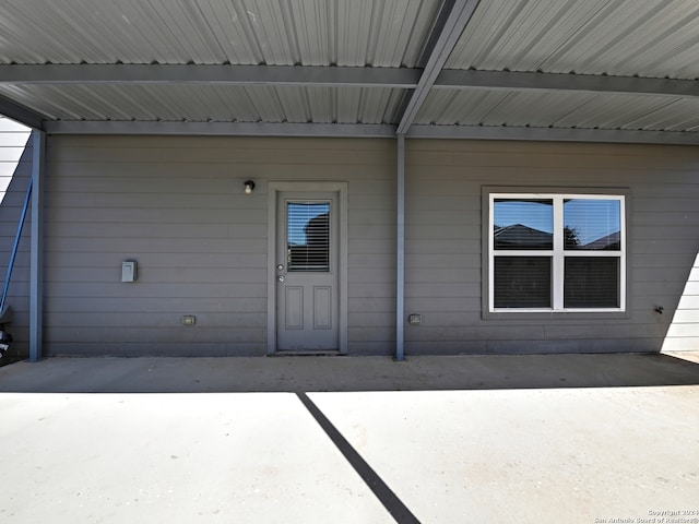 doorway to property featuring a patio