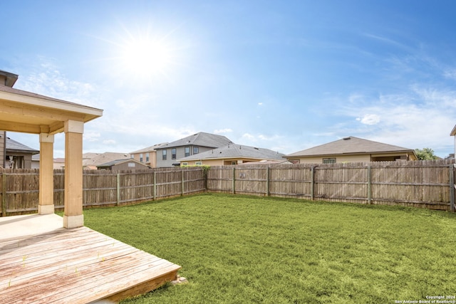 view of yard featuring a deck