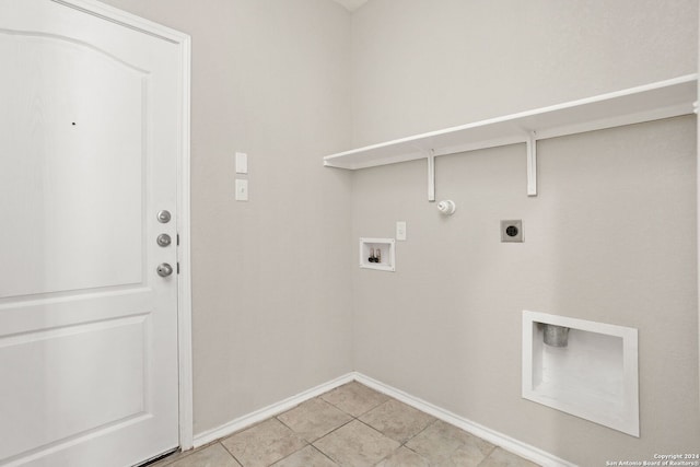 laundry area with washer hookup, light tile patterned floors, hookup for a gas dryer, and electric dryer hookup