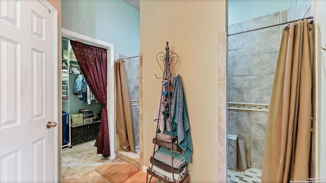 bathroom with a shower with shower curtain