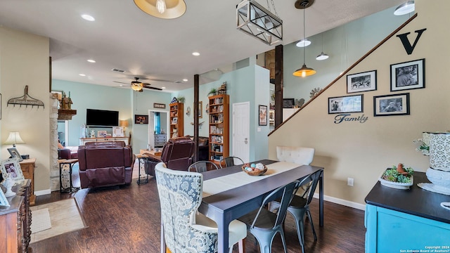 dining area with dark hardwood / wood-style floors and ceiling fan