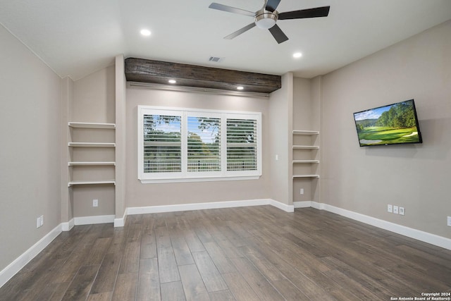 unfurnished living room featuring ceiling fan, dark hardwood / wood-style flooring, and vaulted ceiling