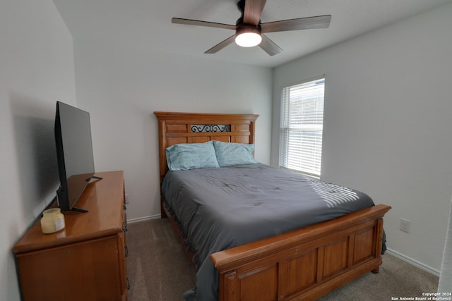 bedroom featuring ceiling fan and carpet floors