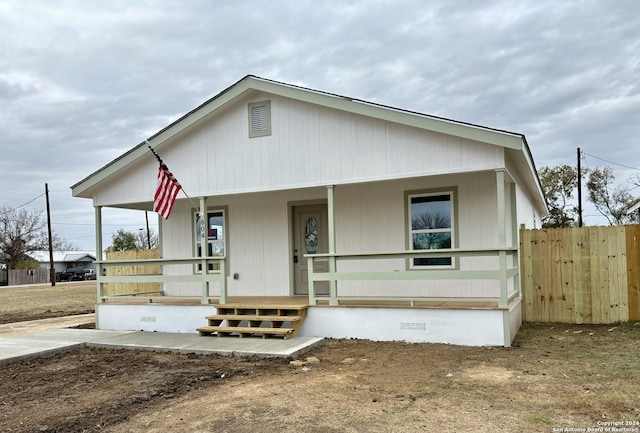 view of front of property featuring covered porch