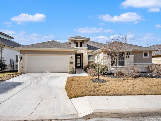 prairie-style home with a garage