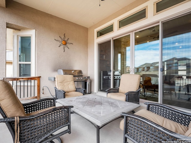 view of patio with a grill