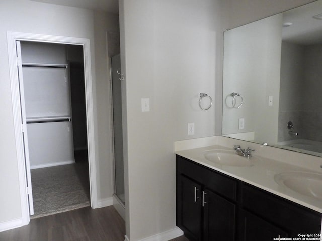 bathroom featuring hardwood / wood-style floors and vanity