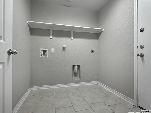 laundry area featuring hookup for a gas dryer, hookup for a washing machine, light tile patterned floors, and hookup for an electric dryer