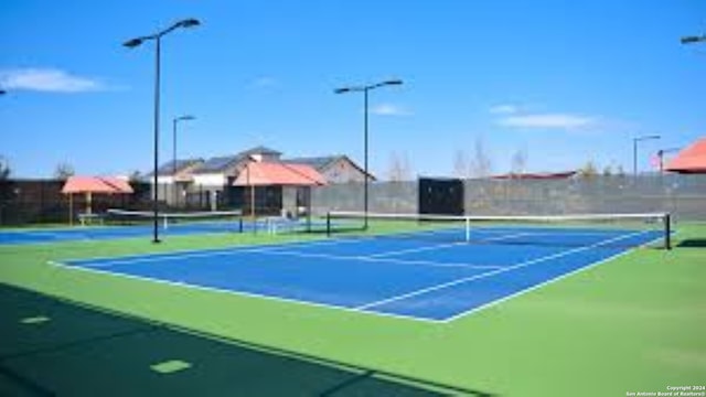 view of sport court with basketball court